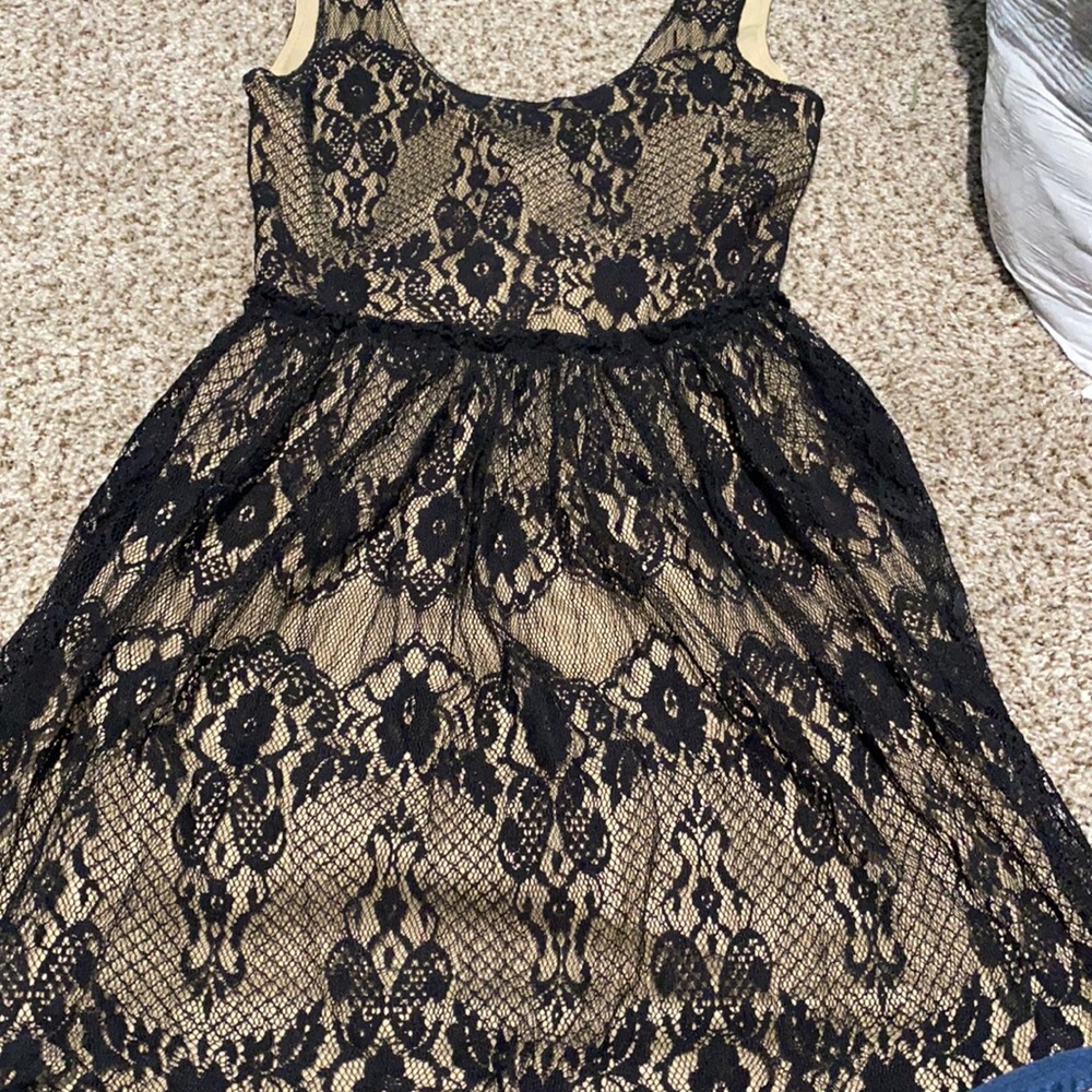 Wet seal, size Small and its black and gold